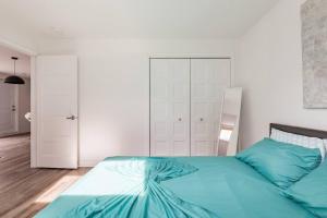 Postel nebo postele na pokoji v ubytování Logement neuf, spacieux