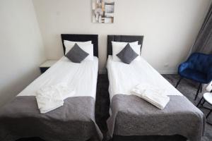 Postel nebo postele na pokoji v ubytování Hotel Soimul
