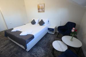 Postel nebo postele na pokoji v ubytování Hotel Soimul
