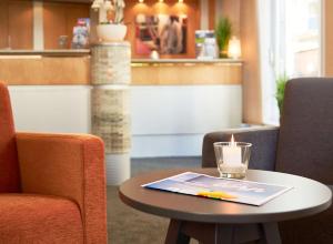 Posezení v ubytování ATLANTIC Hotel Vegesack