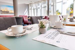 Posezení v ubytování ATLANTIC Hotel Vegesack