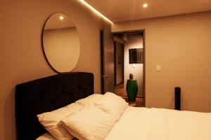 Postel nebo postele na pokoji v ubytování Hermoso LOFT en Guaduas