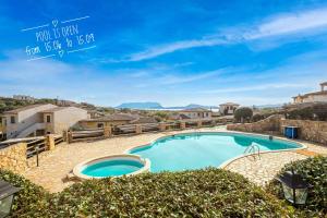 a view of a swimming pool in a villa at Casa Vacanze Lo Squalo in Olbia