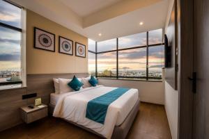 The Lofts at Central Point客房内的一张或多张床位