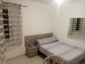 Posteľ alebo postele v izbe v ubytovaní Alojamientos Playa Centro Corralejo a