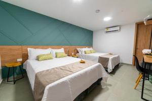 Postel nebo postele na pokoji v ubytování Casa Gracia Hotel Boutique