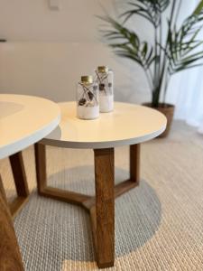 a table with two shoes sitting on top of it at Ferienwohnung Amselweg Haiger in Haiger +11 photos