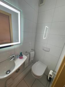 Koupelna v ubytování Hotel Hildesheimer Hof