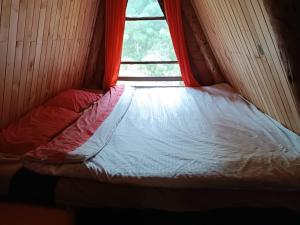 Postel nebo postele na pokoji v ubytování Chalets Amarelo
