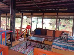 Posezení v ubytování Chalets Amarelo