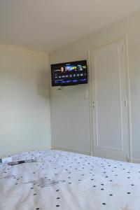 TV a/nebo společenská místnost v ubytování Appartement modulable + 15 fotografií