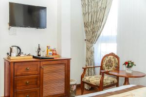 TV a/nebo společenská místnost v ubytování Diamond Hotel