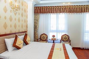Postel nebo postele na pokoji v ubytování Diamond Hotel