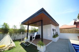 Zahrada ubytování Vill de Reyes-Eroles Private Resort + 9 fotografií