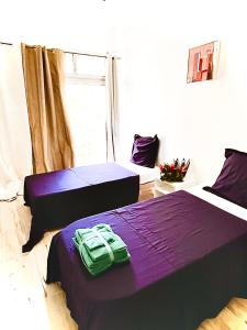 Letto o letti in una camera di Marvelsun