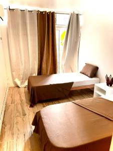 Letto o letti in una camera di Marvelsun