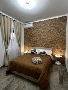 Ένα ή περισσότερα κρεβάτια σε δωμάτιο στο Time to Relax