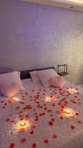 Giường trong phòng chung tại Lescapade +7 ảnh