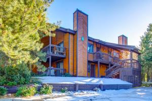 a large building with a staircase in front of it at Red Pine By Park City Vacations in Park City