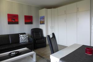Χώρος καθιστικού στο Tief 10 Ferienwohnung Sand mit Internet 101