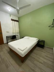 Postel nebo postele na pokoji v ubytování Posada Coral