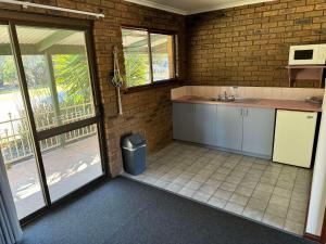 a kitchen with a sink and a counter top at Tooleybuc Motel in Tooleybuc