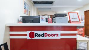 Majutusasutuses RedDoorz Plus near Uptown BGC Mall olev sertifikaat, autasu, silt või muu dokument