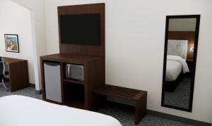 Postel nebo postele na pokoji v ubytování Quality Suites