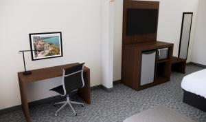 Postel nebo postele na pokoji v ubytování Quality Suites