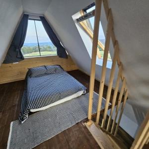 Postel nebo postele na pokoji v ubytování La Runc