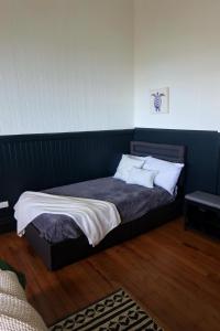 Voodi või voodid majutusasutuse Howzit Hostels Hawaii toas