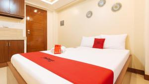 Voodi või voodid majutusasutuse RedDoorz Plus near Uptown BGC Mall toas
