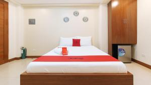 Voodi või voodid majutusasutuse RedDoorz Plus near Uptown BGC Mall toas