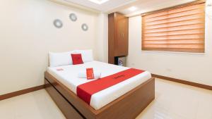 Voodi või voodid majutusasutuse RedDoorz Plus near Uptown BGC Mall toas
