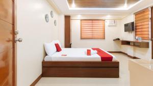 Voodi või voodid majutusasutuse RedDoorz Plus near Uptown BGC Mall toas