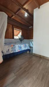 Ένα ή περισσότερα κρεβάτια σε δωμάτιο στο Lia Del Mar