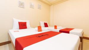 Voodi või voodid majutusasutuse RedDoorz Plus near Uptown BGC Mall toas