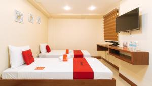 Voodi või voodid majutusasutuse RedDoorz Plus near Uptown BGC Mall toas
