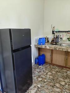 Kuchnia lub aneks kuchenny w obiekcie Buhay Probinsya - Bubolongan