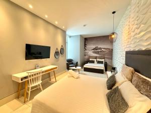 TV a/nebo společenská místnost v ubytování Bonita Bay Concept Hotel by Xarm Hotels