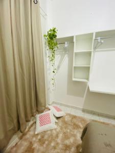 Ένα ή περισσότερα κρεβάτια σε δωμάτιο στο Apartamento no Centro da Cidade Nova- 4 min do Aeroporto