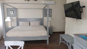 Postel nebo postele na pokoji v ubytování Cadaques Caribe Palmera 101