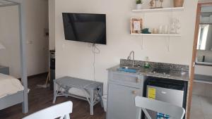 Kuchyň nebo kuchyňský kout v ubytování Cadaques Caribe Palmera 101