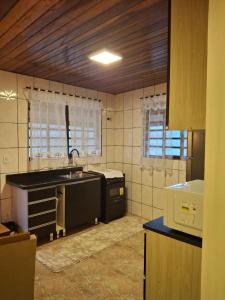Dapur atau dapur kecil di Pousada serrano