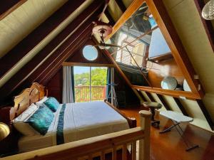 Postel nebo postele na pokoji v ubytování Romantic Attic