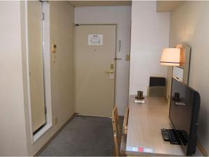 TV a/nebo společenská místnost v ubytování Silk Hotel