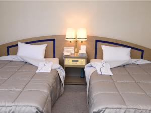 Voodi või voodid majutusasutuse Silk Hotel toas +37 fotot