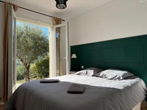 Postel nebo postele na pokoji v ubytování La Garrigue - Villa au cœur des Alpilles