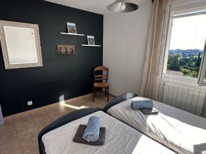 Postel nebo postele na pokoji v ubytování La Garrigue - Villa au cœur des Alpilles