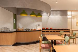Кухня или мини-кухня в Holiday Inn Almaty
